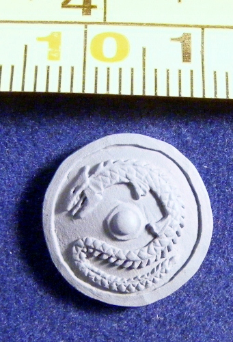 ACR45 round shield with wyrm motif